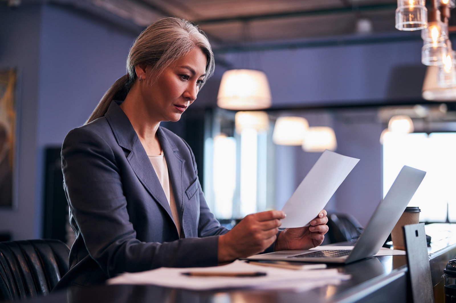 beautiful-businesswoman-studying-project-papers-at-2024-10-21-14-52-31-utc.jpg